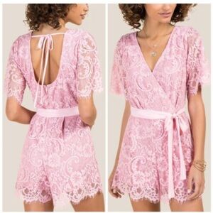 Francesca’s Scarlett Surplus Tie Back Lace Romper Pink Small
